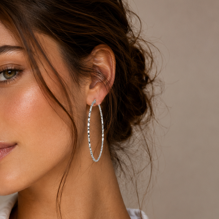 Silver 925 Diamond Cut Twisted Oval Hoop Earrings - ARE00054 | Silver Palace Inc.