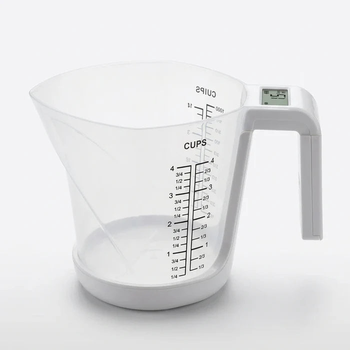 Enhanced Kennedy Measuring Cup Scale clear cup on countertop
