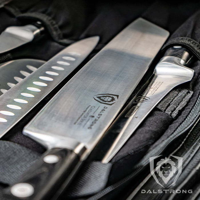 Dalstrong ballistic series dark camo premium knife roll with knives inside.