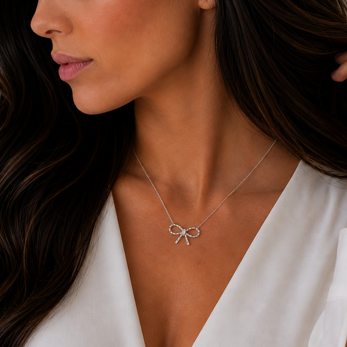 Rhodium Plated 925 Sterling Silver Diamond Cut Dainty Ribbon Bow Necklace - TGN00019